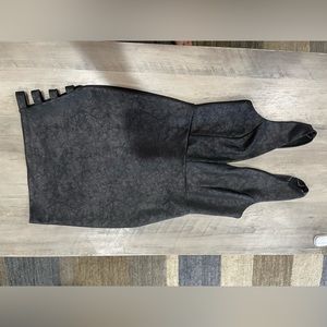 Black low V body con dress